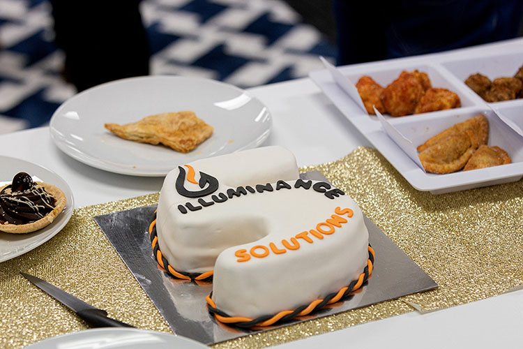 Cake shaped as the number 5 with illuminance logo