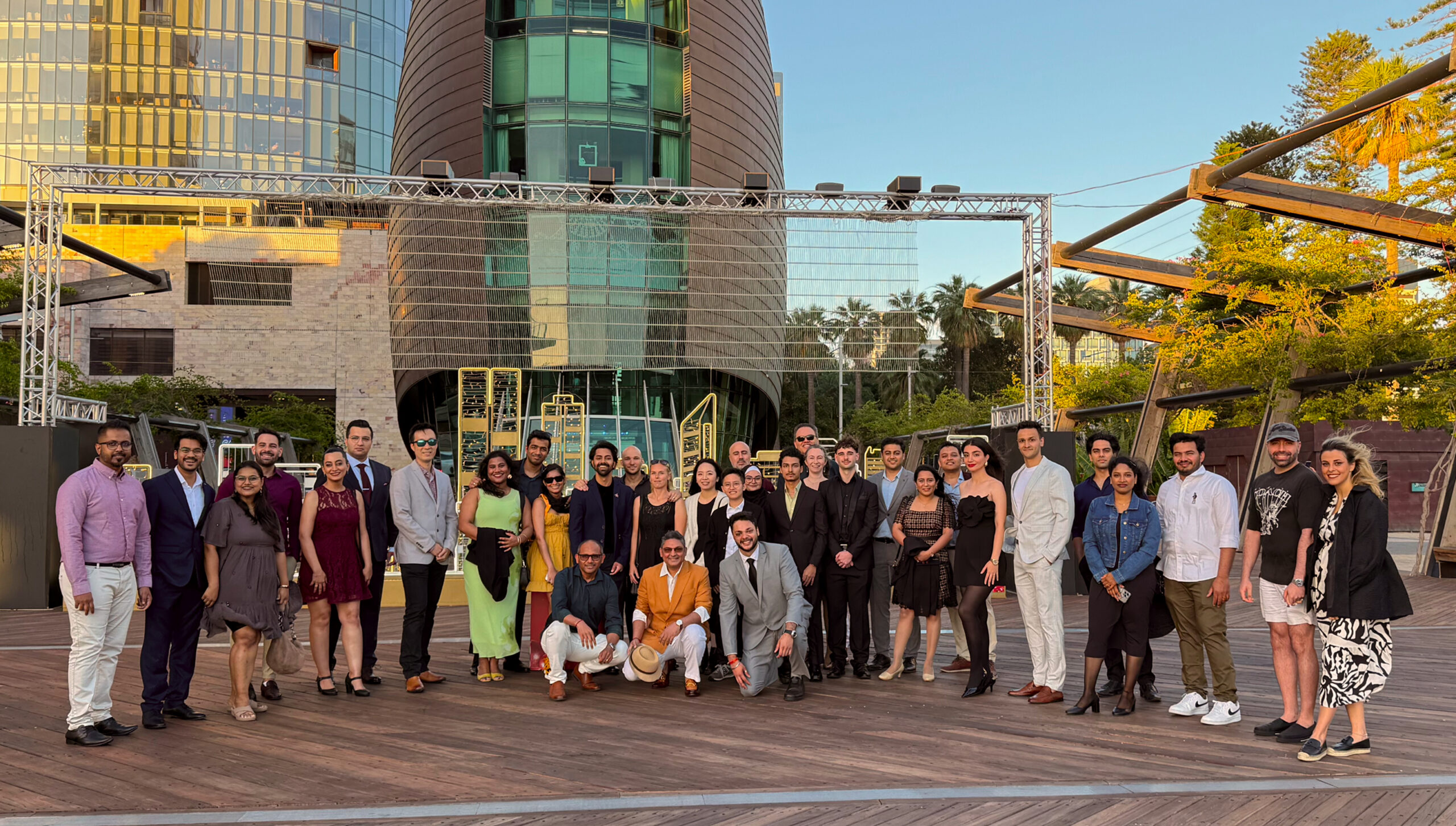 Group photo by the Bell Tower - illuminance Solutions Group photo by the Bell Tower - illuminance Solutions